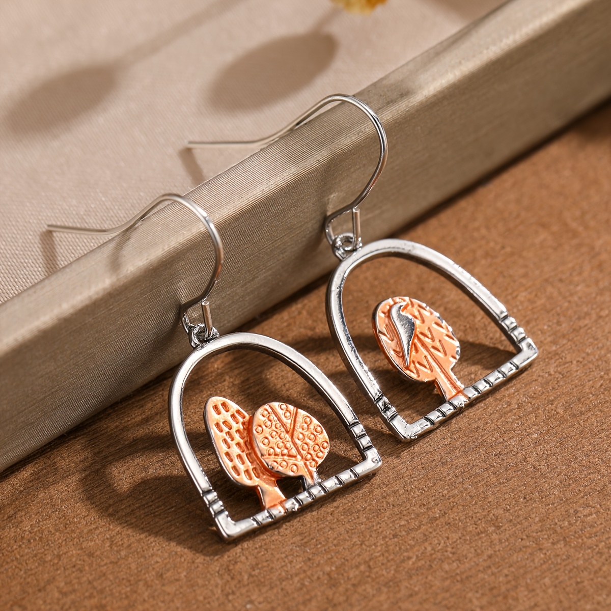 Women's Retro Pastoral Forest Bird Tree Relief Earrings